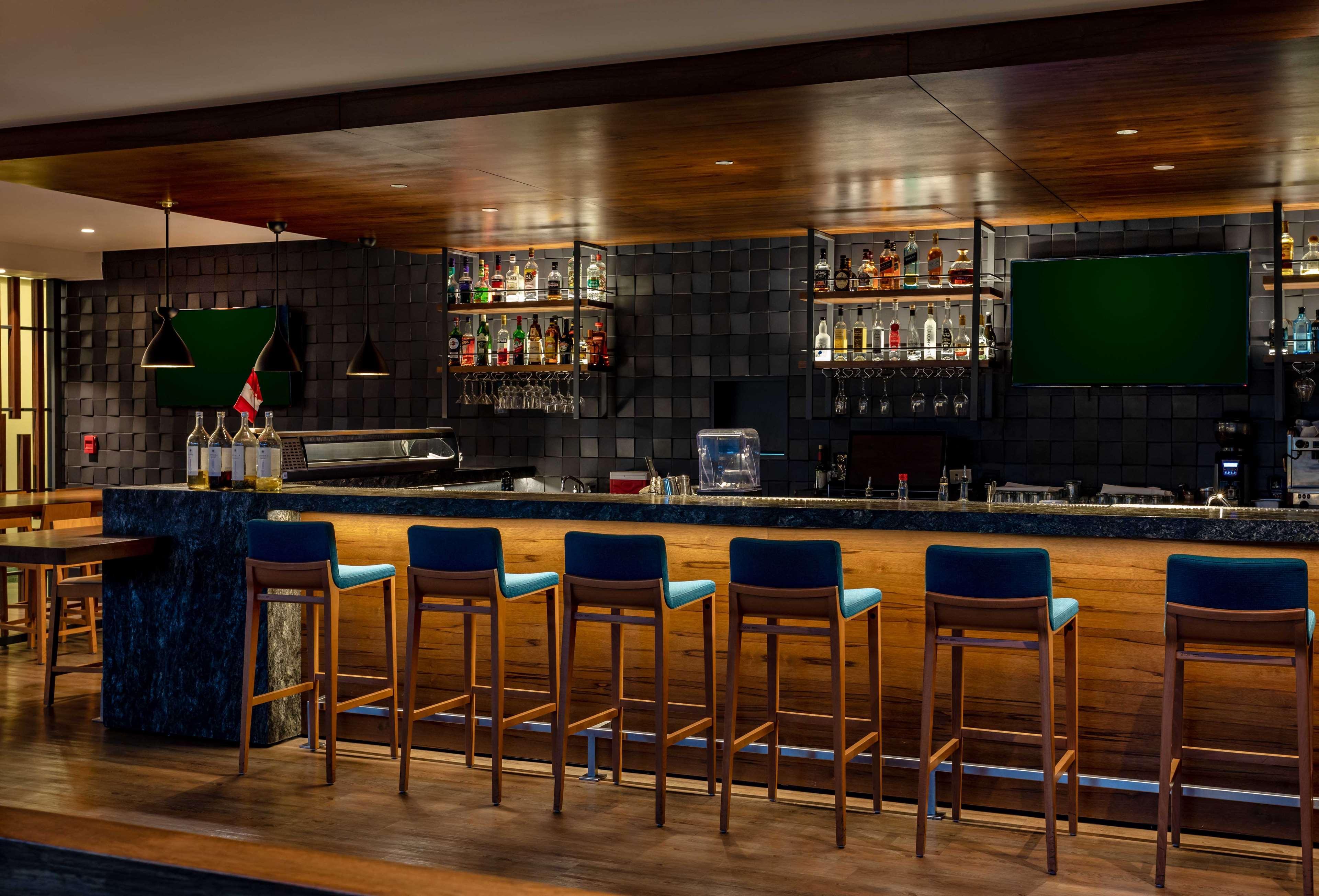 Sonesta Hotel El Olivar Lima Exterior photo The bar at the Swiss First Lounge at Zurich Airport